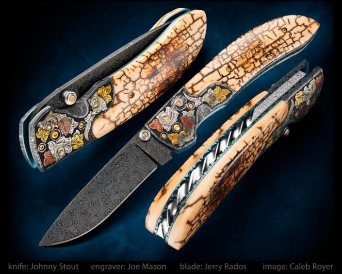 My popular double action automatic folder with a Jerry Rados, 3 3/8 inch Turkish Twist Damascus blade, Robert Eggerling mosaic damascus bolsters engraved with 24 karet gold and pure copper inlay by Joe Mason... exhibition grade museum fit crackle mammoth ivory scales, and fileworked backspacer and liners. Overall length is 7 5/8 inches. This one has been sold, I am accepting orders on a similar model.